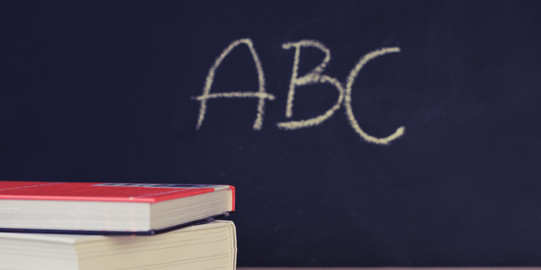 Two Books Beside Two Chalks